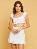 Conjunto de saia e malha cropped Laise