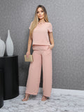 Conjunto elegante de blusa de manga curta e calça para mulheres