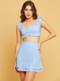 Conjunto de saia e malha cropped Laise