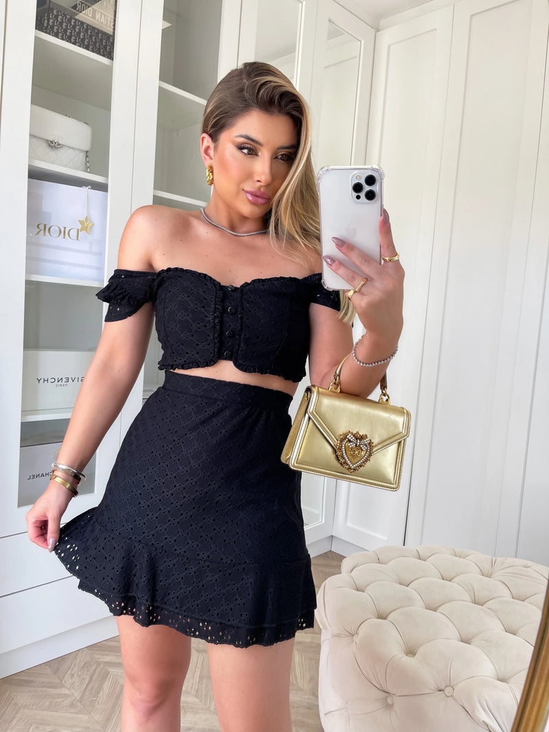 Conjunto de saia e malha cropped Laise