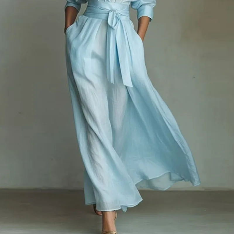 Vestido Longo com Recortes Vazados e Bolsos