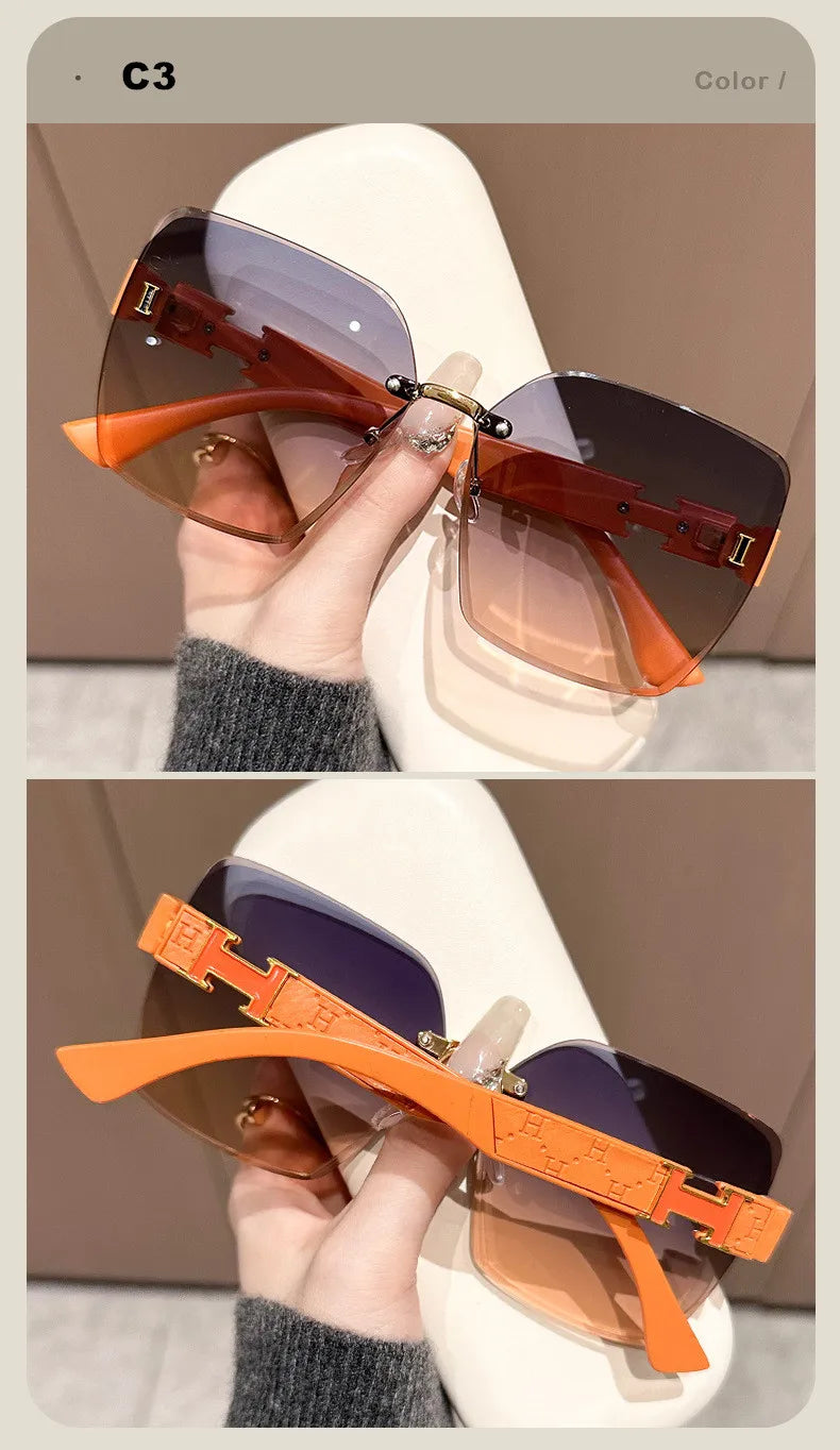 New women's anti-UV large frame sunshade versatile sunglasses frameless fashion sunglasses(DS-1019)