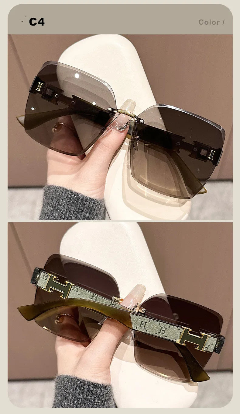 New women's anti-UV large frame sunshade versatile sunglasses frameless fashion sunglasses(DS-1019)