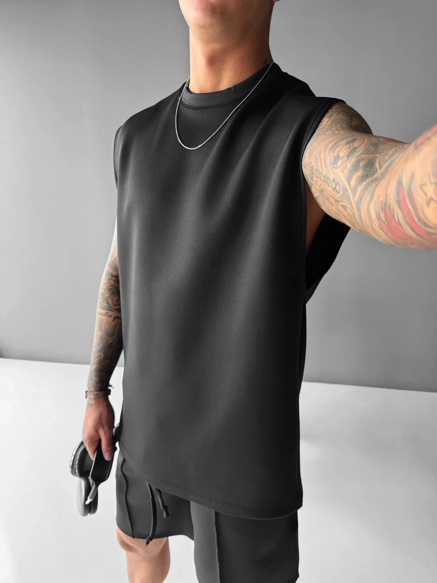 Terno esportivo sem mangas 2025 calças casuais masculinas de cor sólida, colete de roupas masculinas, conjunto de duas peças